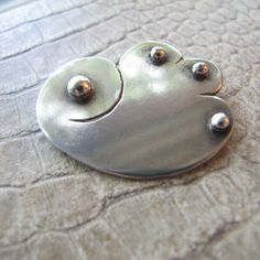 "Art Jewelry, Handmade OOAK Sterling Brooch Pin, Amorphic Nebulous Cloud Shape Form, Artisan Studio One of a Kind Sterling Silver Pin Brooch, stamped \"sterling\" in 2 places on reverse, handmade. Maker unknown, vintage age, modest size.   uniquely shaped  sterling silver  as shown, good condition  handmade  1 7/16 IN x 1 3/16 IN  9.2 grams" Handmade Pendant Brooches, Unique Handmade Pendant Brooch, Handmade Artistic Silver Brooch, Handmade Artisan Silver Brooches, Unique Silver Brooch Pin, Unique Sterling Silver Brooch, Unique Pendant Brooches For Anniversary, Unique Brooches For Anniversary, Unique Anniversary Brooches