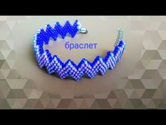 a bracelet made out of blue beads with the word spacer on it and an image of