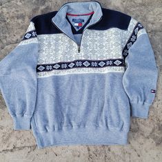 Vintage 1990s Tommy Hilfiger Fleece Sweater. Great Condition. No Damage. Stored In Cedar Closet. Gray With Navy Winter Print Detail. 1/4 Zip Neck. Pockets. 23.5" Width. 22" Sleeve. 27" Length. Mens Medium Tommy Hilfiger Long Sleeve Sweatshirt For Streetwear, Tommy Hilfiger Crew Neck Winter Sweatshirt, Vintage Tommy Hilfiger Sweatshirts, Tommy Hilfiger Cotton Crew Neck Hoodie, Tommy Hilfiger Cotton Hoodie Sweatshirt, Cedar Closet, Tommy Hilfiger Shirts, Shirts Vintage, Winter Print