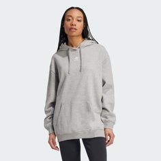 adidas Shop the Essentials Oversized Fleece Hoodie - Grey at adidas.com/us! See all the styles and colors of Essentials Oversized Fleece Hoodie - Grey at the official adidas online shop.