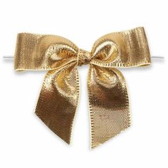 a gold bow on a white background