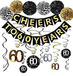 cheers to 50 years hanging decorationating with balloons and streamers in black, gold and silver