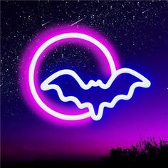 a purple and blue neon sign with a bat in the center on a night sky background