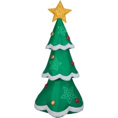 a green christmas tree with gold stars on top