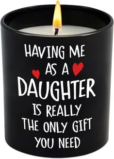 a black candle that says having me as a daughter is really the only gift you need