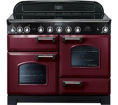 a red stove top oven with two burners