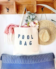 The POOL BAG over sized canvas tote bag is perfect for any poolside day!  Available with text in several colors... check out the variations!  This bag is made from 100% thick, sturdy canvas. AVAILABLE IN TWO SIZES * Large - 19.5" x 13" with a 4" gusset *Jumbo - 23" x 13" with a 6" gusset   These bags are hand painted using non-toxic fabric paint.  The technique used creates an attractive distressed appearance to the text that varies from bag to bag.  All of my products are made to order.  Produc Summer Tote Bag For Pool, Summer Pool Tote Bag, Perfect Beach Bag, Minimalist Tote Bag, Pool Bag, Minimalist Tote, Mom Bag, Bag Minimalist, Mom Bags