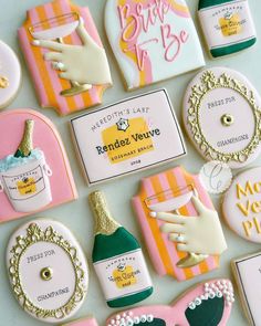 decorated cookies are arranged on a table for someone's special birthday or baby shower