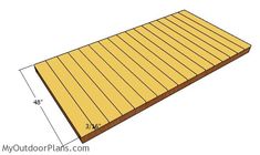 a wooden deck with measurements for the width