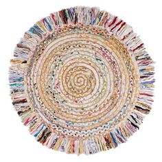 a round rug made out of magazines on a white background