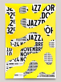 a yellow poster with black and white numbers on it's sides, including the words jazz