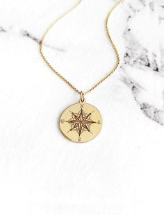 Gold Medallion Jewelry For Travel, Personalized Gold Jewelry For Travel, Gold Compass Design Charm Necklace, Gold Charm Necklace With Compass Design, Yellow Gold Compass Design Charm Necklace, Yellow Gold Charm Necklace With Compass Design, Gold Engraved Jewelry For Travel, Travel Engraved Gold Jewelry, Compass Pendant Necklace