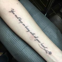 a person with a tattoo on their arm that says, somewhere there is always hope