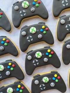 decorated cookies in the shape of video game controllers