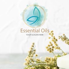 the logo for essential oils is shown next to some flowers