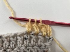 the crochet stitch is being worked on