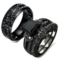 two black rings with diamonds on them