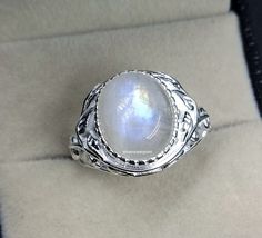 "Natural Moonstone Ring oval 925 sterling silver Christmas gift /gift for her beauty ring Handmade Anniversary Jewelry June Birthstone Stone Name = Moonstone Ring Stone Color =   white Ring Size :- All US Sizes Available Metal Purity :- 925 Sterling Silver  Our Goal is 100% Customer Satisfaction Moss Agate Collection  https://www.etsy.com/shop/SilverOceanPoint?ref=seller-platform-mcnav&section_id=39011648 Tourmaline & Ruby Collection  https://www.etsy.com/shop/SilverOceanPoint?ref=seller-platfor Silver Oval Crystal Ring For Gift, White Oval Moonstone Ring Gift, White Oval Crystal Gemstone Ring, Oval White Crystal Gemstone Ring, Oval White Moonstone Ring For Gift, White Oval Cabochon Moonstone Ring For Anniversary, White Oval Cabochon Crystal Ring Gift, Handmade Oval White Gold Moonstone Ring, White Oval Cabochon Ring For Gift