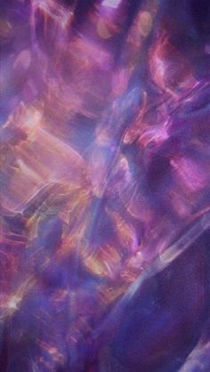 an abstract painting with purple and blue colors