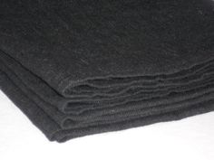 black cloth folded on top of each other