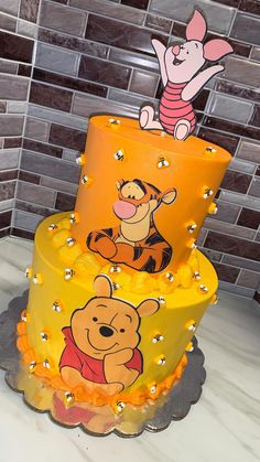 a three tier winnie the pooh cake