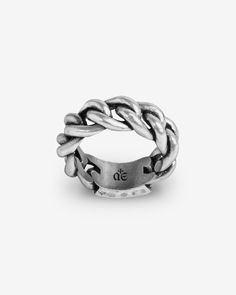 Twisted, soldered, and kissed by a scarred frontage. The Revolution Ring stands as an emblem that embodies a mettled minimalism for all who wear it. A reversible 925 sterling Silver ring featuring chains and a mottled rectangular plate. Wear the ring with its plate facing outwards, or turn it around to let its chains take centre stage. Sold individually. Each piece is lovingly crafted by hand, under ethical working conditions. Please allow for minor imperfections that are true to handcrafted jew White Gold Sterling Silver Chain Link Ring, White Gold Chain Link Ring In Sterling Silver, Silver Link Jewelry For Streetwear, Classic Silver Link Rings, Sterling Silver Link Chain Ring, Classic Silver Chain Ring, Everyday White Gold Jewelry With Oxidized Finish, Silver Jewelry For Streetwear, Sterling Silver Chain Ring