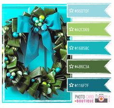 a blue and green christmas wreath with the words photo boutique on it's side