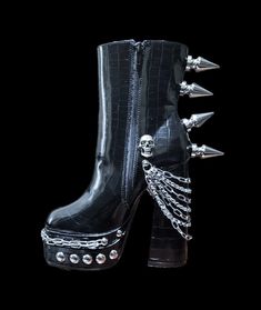 This listing is for this pair of black goth/punk style spiked 6 inches high heel women's boots .available i uk women's size 5 and 6. Made with shiny patern high quality pu leather studded with 44 mm aluminium tree spikes and skulls, accessorised with stainless steel multi-layer chains. Size: uk women's 5 and 6 Material: EVA Style: Punk / Goth The boots itself is not manufactured by me . I did the modifications with metal Embellishments and spikes of my choice . This is a made to order item retur Punk Style Winter Platform Ankle Boots, Punk Style Ankle Platform Boots For Winter, Punk Style Platform Ankle Boots For Winter, Fall Punk Knee-high Platform Boots, Punk Knee-high Platform Boots For Fall, Winter Punk Chunky Platform Boots, Punk Style Platform Boots With Round Toe For Club, Punk Style Chunky Platform Heeled Boots For Winter, Punk Style Platform Boots For Concerts In Fall