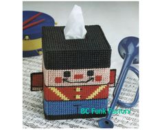 a tissue dispenser made to look like a nutcracker from toy storys