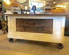 an old fashioned coffee shop has been converted into a bar with wheels to hold it