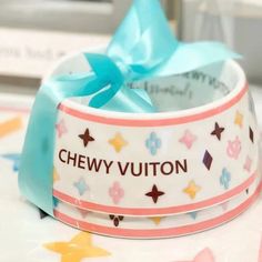 a close up of a ribbon with stars on it and a bow at the top