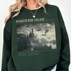 Embrace the romantasy bookish vibe with this Basgiath War College sweatshirt inspired by Fourth Wing fandom! Perfect for dark romance enthusiasts, this Rebecca Yarros merch is a must-have for any fantasy reader. Whether you're gifting a fellow book lover or treating yourself, it's the ultimate fantasy reader gift. Don't miss out—get yours now and join the adventure! This bookish merch is designed for every dragon rider who loves fantasy or romance. College Sweatshirt, Crescent City, Gifts For Readers, Book Lover