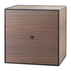 a wooden cabinet with a black metal handle and knob on the front, against a white background