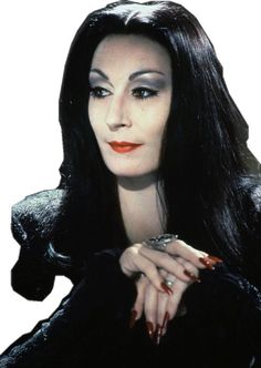 a woman with long black hair and red lipstick