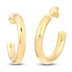 Perfect for any style or look, these timeless women's open hollow hoop earrings are crafted in lustrous 14K yellow gold and secure in place with friction backs. Modern Yellow Gold Open Circle Hoop Earrings, Modern Yellow Gold Open Hoop Earrings, Yellow Gold Shiny Hoop Earrings Fine Jewelry, Yellow Gold Open Circle Hoop Earrings, Yellow Gold Hoop Earrings With Shiny Finish, Jared The Galleria Of Jewelry, Open Hoop Earrings, Earring Backs, Designer Earrings