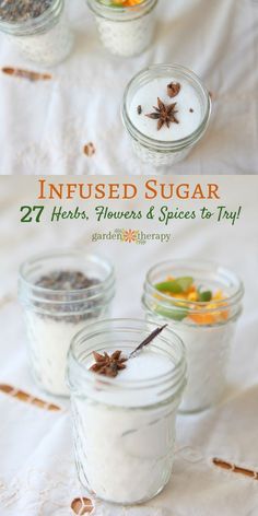 four jars filled with different types of sugar and spices on top of a white table cloth