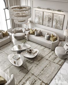 a living room filled with furniture and a chandelier