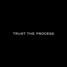 a black background with the words trust the process