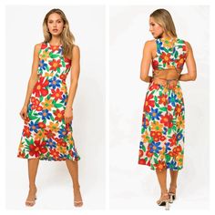 This Midi Dress Features A Vibrant Tropical Floral Print, Perfect For A Fun And Girly Look. The Crew Neckline And Sleeveless Design Provide Comfort, While The Elasticized Waist Creates A Flattering Fit. The Open Back With Button And Lace Down Closure Adds An Eye-Catching Detail. Lined For Coverage, This Non-Stretchy Dress Is Cute And Playful. Materials 100% Polyester Lining: 100% Polyester Made In Guatemala Medium: Length: 50", Bust: 28" True To Size Multicolor Floral Print Midi Beach Dress, Multicolor Floral Print Midi Dress For Beach, White Tropical Print Dress For Garden Party, White Dress With Tropical Print For Garden Party, Tropical Print Midi Sundress For Day Out, Multicolor Tropical Print Midi Dress For Day Out, White Summer Maxi Dress With Vibrant Print, Tropical Multicolor Midi Dress For Day Out, Summer White Maxi Dress With Vibrant Print