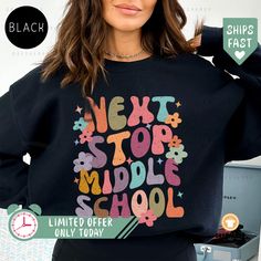 🔥 Use code SAVEMORE at checkout for 30% OFF with 2+ item order. Don't miss out! Celebrate the last day of elementary school and 5th-grade graduation with our Next Stop Middle School Sweatshirt! This middle school shirt is perfect for your little one's transition to middle school. The design features a fun Middle School Sign and the text "Hello Middle School" to mark the occasion. It also makes a great gift for a middle school grad or as an 8th-grade graduation shirt. This kids graduate shirt is Winter School T-shirt With Letter Print, Casual Long Sleeve Tops For Back To School, School Crew Neck Sweatshirt With Graphic Print, Winter Letter Print T-shirt For School, Last Day Of Elementary School, Transition To Middle School, Middle School Hacks, 8th Grade Graduation, School Sweatshirts