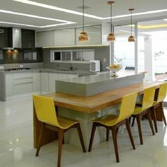 the kitchen is clean and ready to be used as a dining room or office space