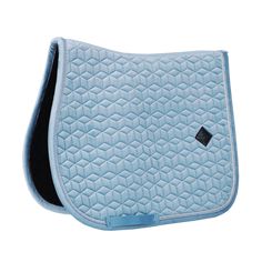 a light blue saddle pad with black piping on the front and sides, showing an intricate pattern