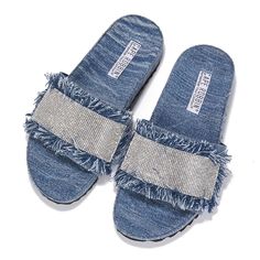 These stylish denim sandals are the perfect statement piece for any outfit. They feature a fringe accent, rhinestone detail, and a soft insole for all-day comfort. With a unique design and eye-catching details, these sandals will make a statement wherever you go. Made from high-quality denim, making them durable and reliable. denim sandals fringe accent rhinestone detail soft insole slider sandals denim sliders wide foot-friendly Runs big. Sizing down recommended! Model normal size is 7 1/2. Wea Open Toe Denim Sandals For Summer, Denim Open Toe Sandals For Summer, Summer Denim Open Toe Sandals, Casual Rhinestone Sandals For Spring, Trendy Denim Sandals For Summer, Beach Denim Blue Sandals, Denim Blue Beach Sandals, Flat Denim Blue Sandals, Denim Flat Sandals For Vacation