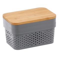 a gray basket with a wooden lid and perforated sides on a white background