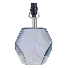 a clear glass bottle with a metal stopper on the top is shown in front of a white background