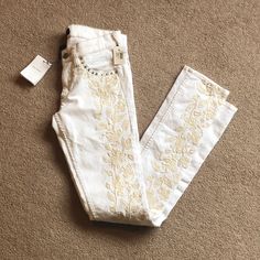 Sold Out Isabel Marant’s Off-White Stretch Denim Jeans Are Sure To Become A Coveted Style. Snaking Cream Embroidery And Studded Pockets Add To Their Cool Appeal. Wear Yours Dressed Up Or Down. Measurements Elegant White Bottoms With Chikankari Embroidery, Elegant White Chikankari Embroidery Bottoms, Elegant White Chikankari Embroidered Bottoms, Fitted White Embroidered Bottoms, Elegant White Embroidered Bottoms, White Embroidered Jeans For Spring, Spring White Embroidered Jeans, White Embroidered Cotton Jeans, Cream Embroidery