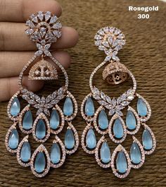 Luxury Jhumkas With Intricate Design For Festive Occasions, Luxury Traditional Jhumkas With Intricate Design, Luxury Elegant Designer Jhumkas, Luxury Intricate Design Jhumkas Drop Earrings, Luxury Intricate Design Jhumkas, Wedding Jewellery Designs