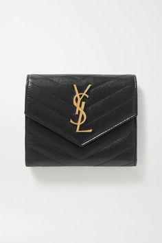 SAINT LAURENT's wallet has been made in Italy from quilted textured-leather and topped with the label's iconic 'YSL' plaque in gold. It's fitted with two cardholder slots and has space for cash or receipts.Wear it with: [SAINT LAURENT Sweater id1239054]. Saint Laurent Sweater, Leather Wallet Design, Monogram Quilt, Teenage Outfits, Louis Vuitton Wallet Zippy, Quilted Wallet, Cute Wallets