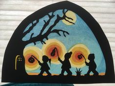 the silhouettes of three children are holding hands under a tree with moon in the background