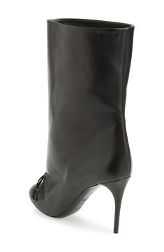 The widened, slouchy shaft sweeping the 2024 runways is highlighted in this Italian-leather boot framed by a towering stiletto and a dainty bow. 3 1/2" (90mm) heel (size 39) 9" shaft Pull-on style Leather upper and lining/rubber sole Made in Italy Designer Shoes Luxury Leather Mid-calf Boots With Sculpted Heel, Alaia Ss23, Alaia Boots, Alaia Runway 2024, Alaia Shoes, Italian Leather Boots, Leather Boots Women, Leather Boot, Fabric Gift Bags